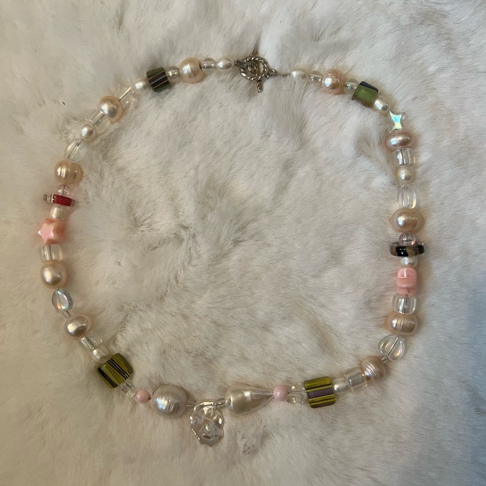 Handmade pearl and beed necklace with starts, hearts, pastel color pallet